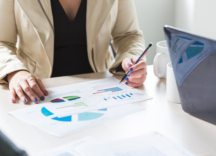 Woman write on the report. Photo: unsplash.com
