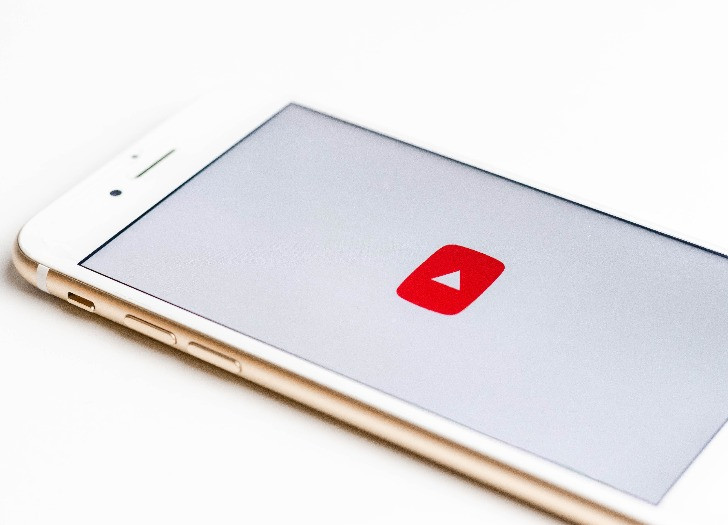 Phone with Youtube logo in the middle. Photo: unsplash.com
