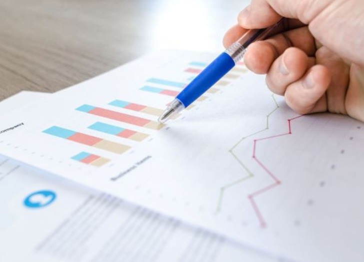 Data and charts on the paper. Photo from unsplash.com